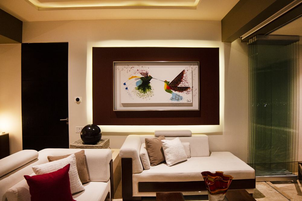 Living room with hummingbird artwork